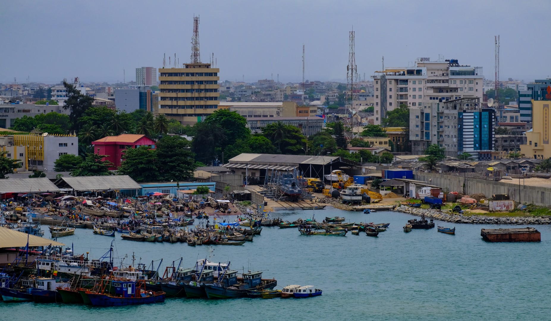 Fishing boats anchored in a harbour on the coast of Benin, in the Gulf of Guinea. Fishing boats anchored in a harbour on the coast of Benin, in the Gulf of Guinea.